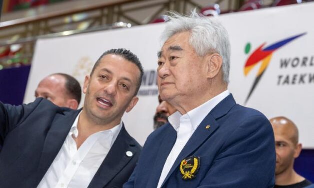 World Taekwondo (WT) council member Maher Magableh, left, talks to WT and Taekwondo Humanitarian Foundation President Choue Chung-won